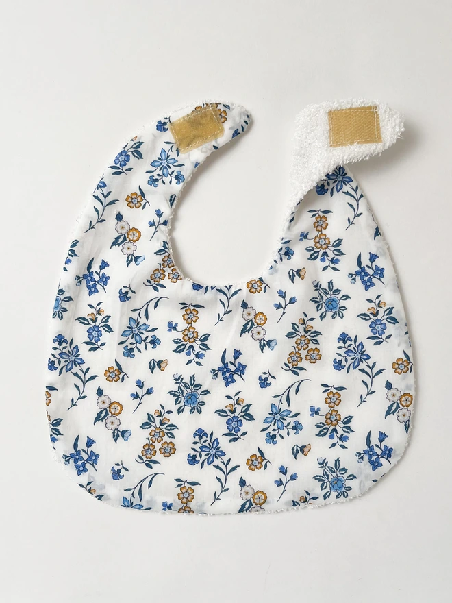 Liberty baby bib to show fastening 