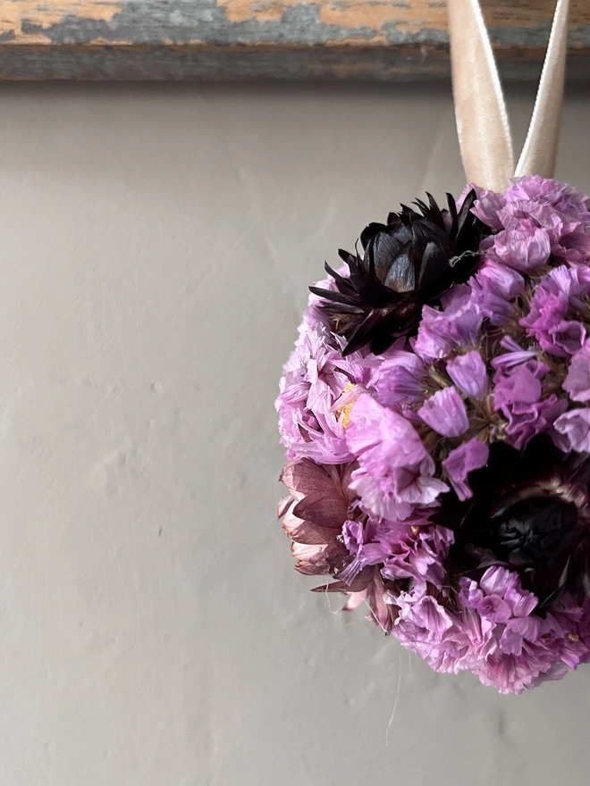 Berry Dried Flower Bauble made using a selection of pink and purple dried flowers