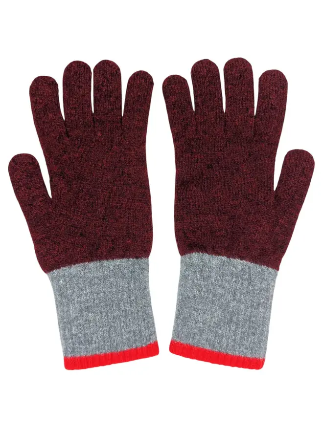 Block Lambswool Gloves, a pair of colourful gloves sitting on a plain white surface. 