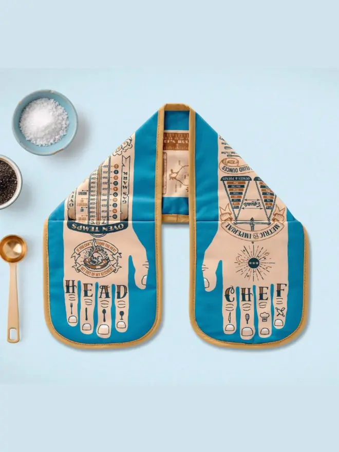 Head Chef Double Oven Glove, against a blue background. 