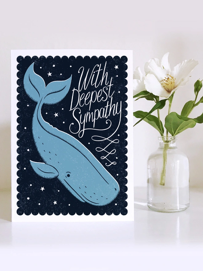 blue whale sympathy card with white flower