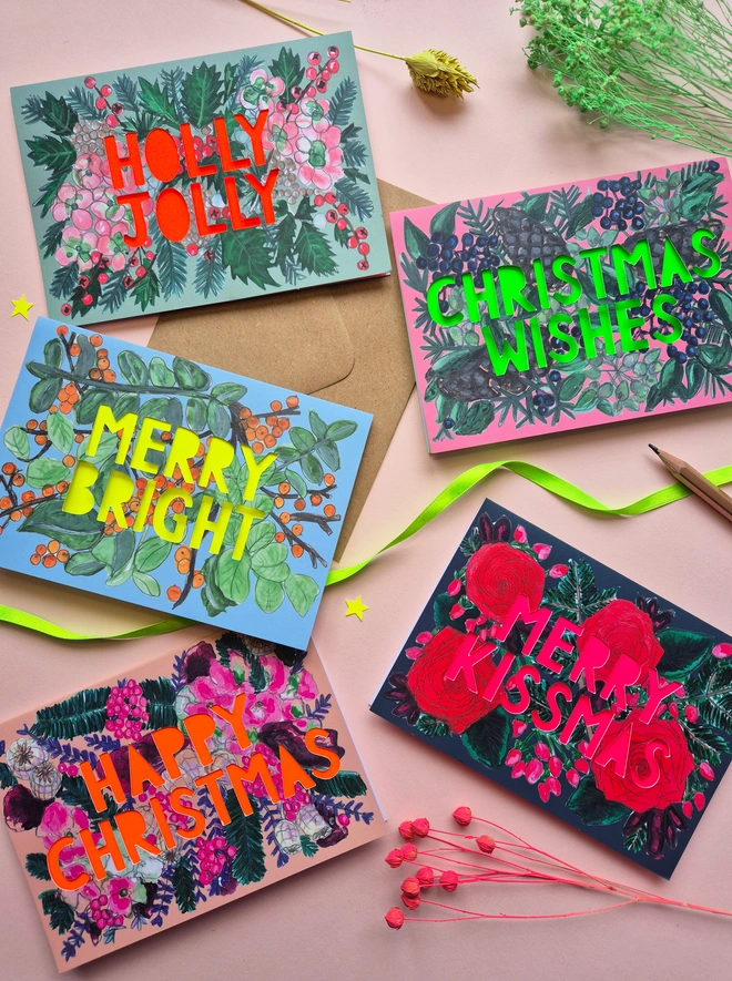 Five pack of Christmas Cards with assorted botanical neon floral designs 