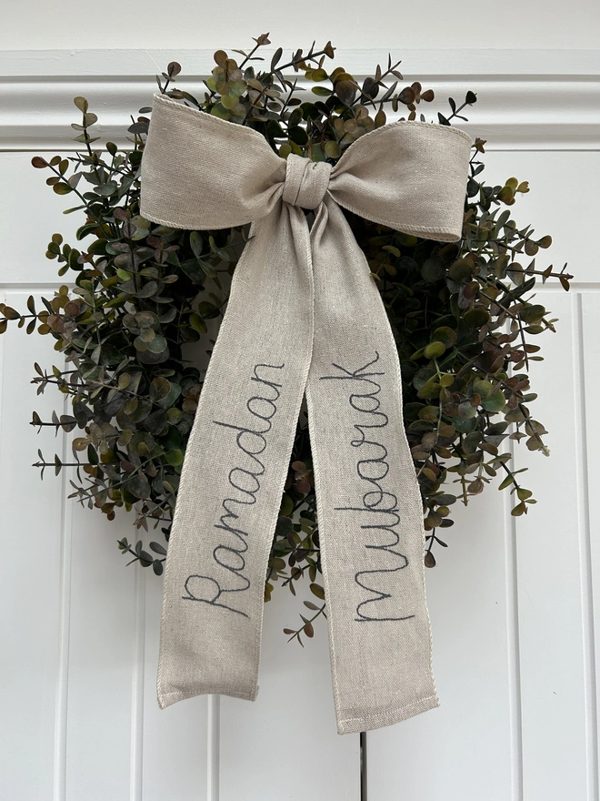 wired linen bow on wreath