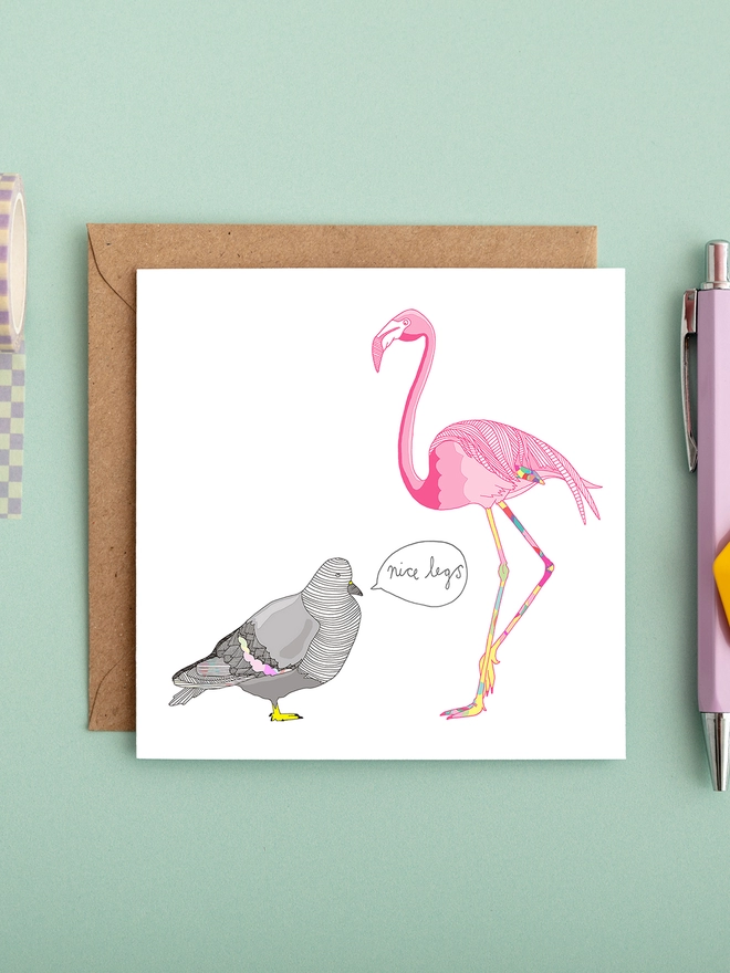 humorous and funny greeting card featuring a joking pigeon and flamingo