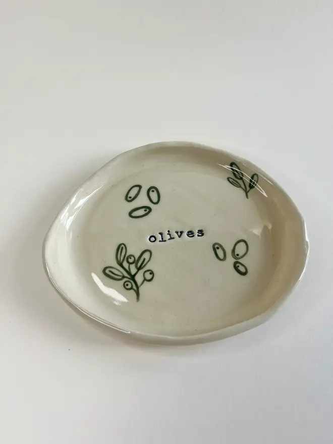 'Olives' Small Plate, placed on table. 