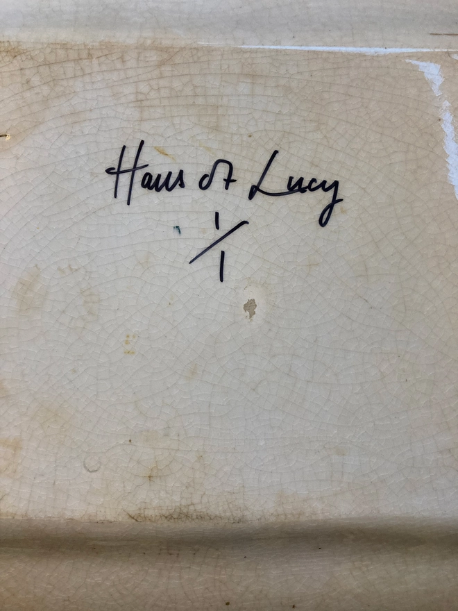 Haus of Lucy signature on back of plate