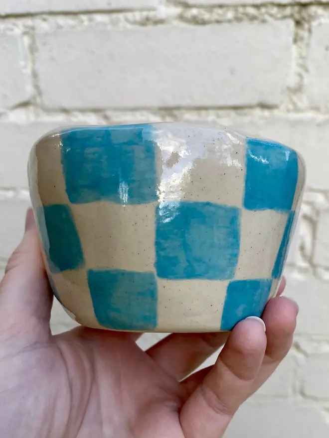 blue white check handmade ceramic smiley face pot