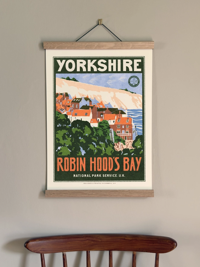 Visit Robin Hood's Bay print, framed on a wall