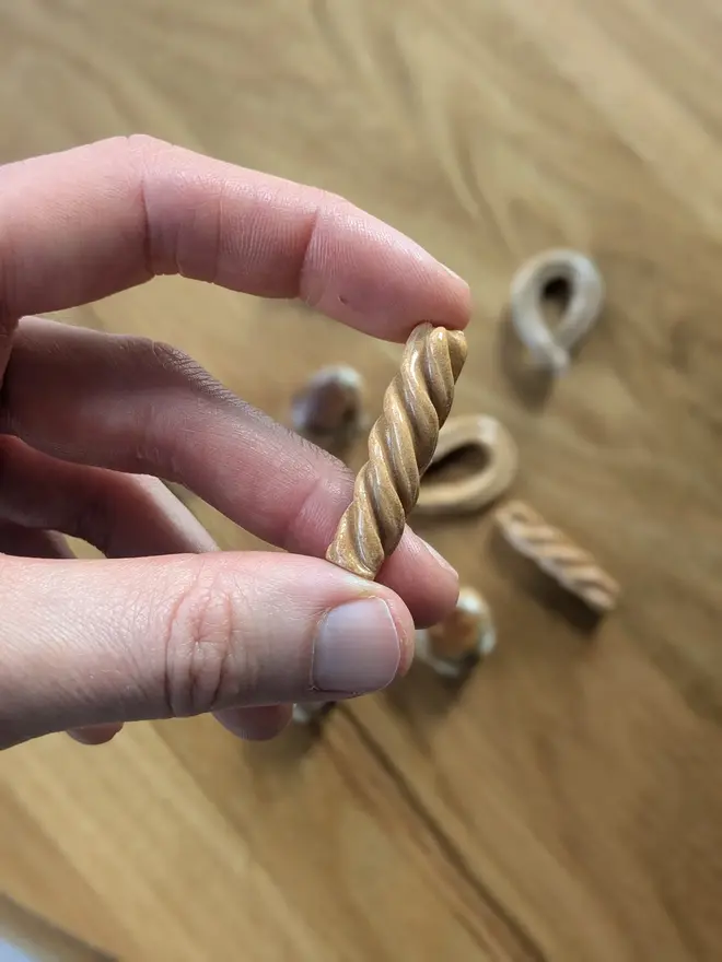 ceramic pasta magnet. a fusilli ceramic fridge magnet.