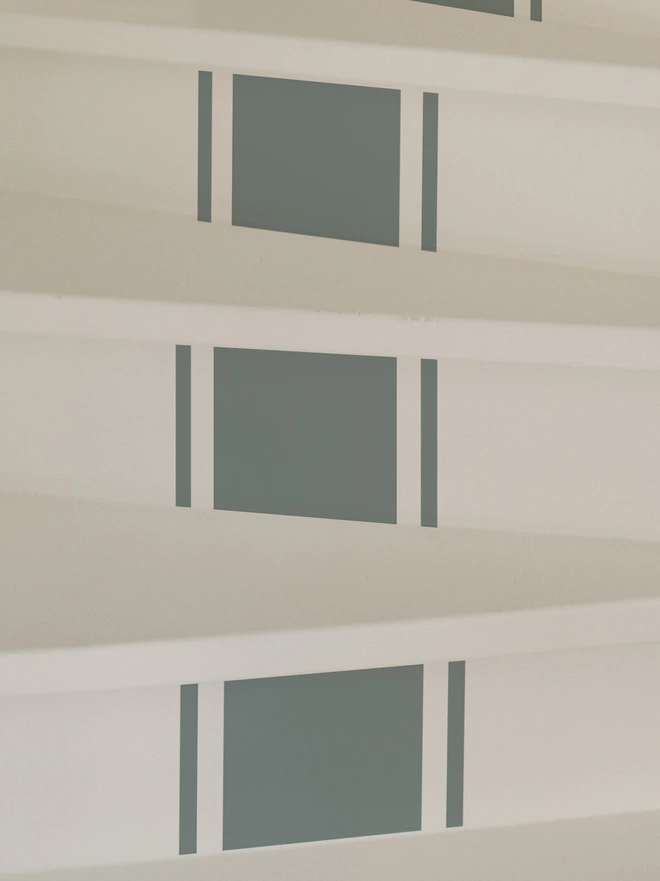 Close up of Classic stripe stairs sticker decals on white stair case