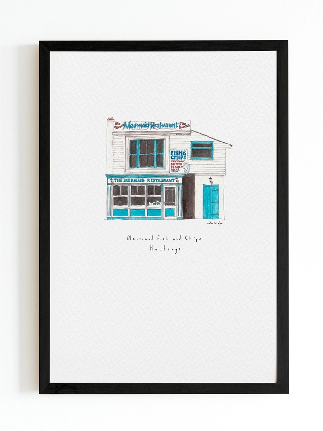 Watercolour illustration of Mermaid Fish and Chips a white and blue seaside fish and chip shop. The illustration is a small watercolour painting in the centre of the white page and sits within a black frame. 