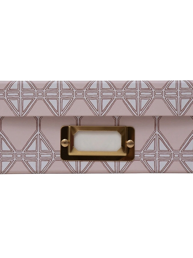 Tijan Lidded Portfolio Box, a colourful portfolio box sitting on a plain surface. 