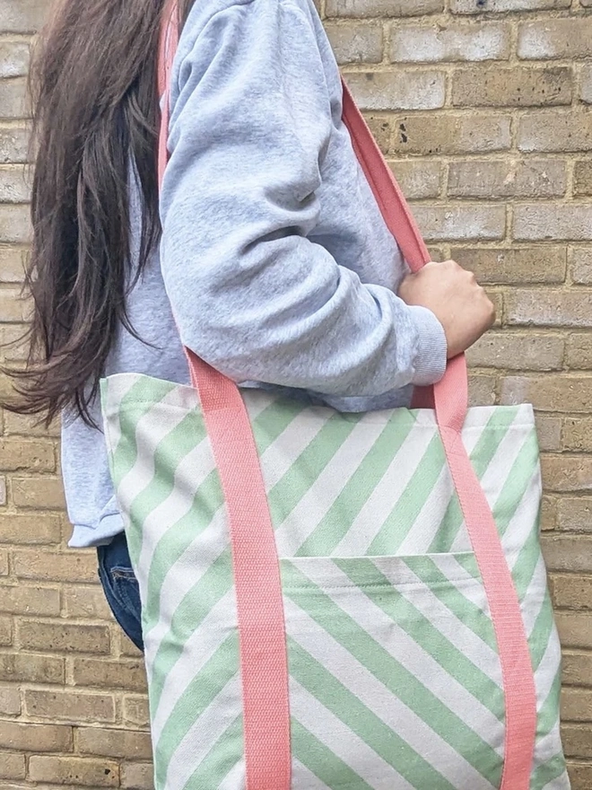Tote Cotton Shopper Bag, a woman holding a colourful patterned tote bag over her shoulder. 