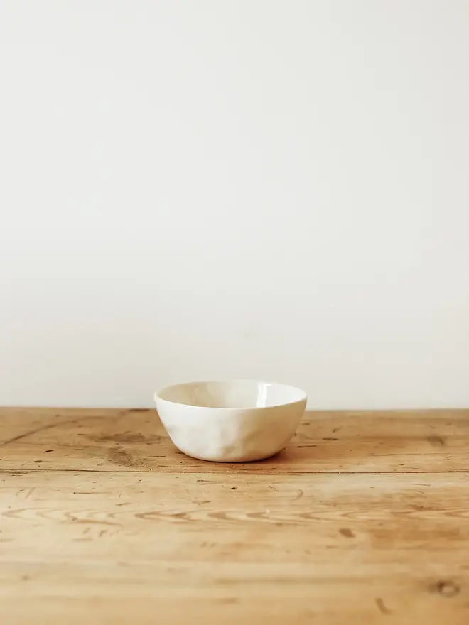 'milk' handcrafted stoneware bowl. a small white serving bowl.