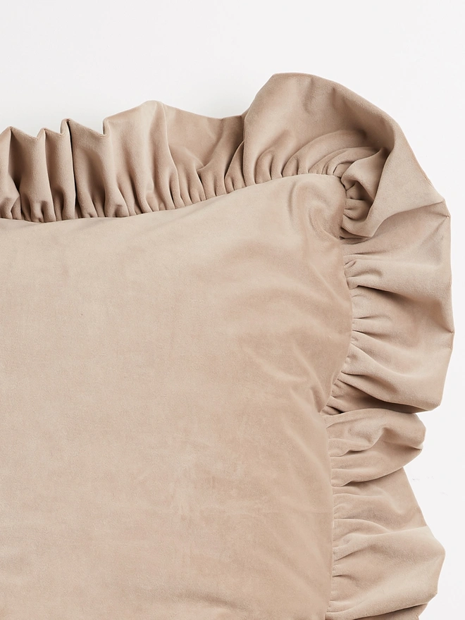 Kika Bespoke ruffled velvet cushion ruffle detail in stone. 