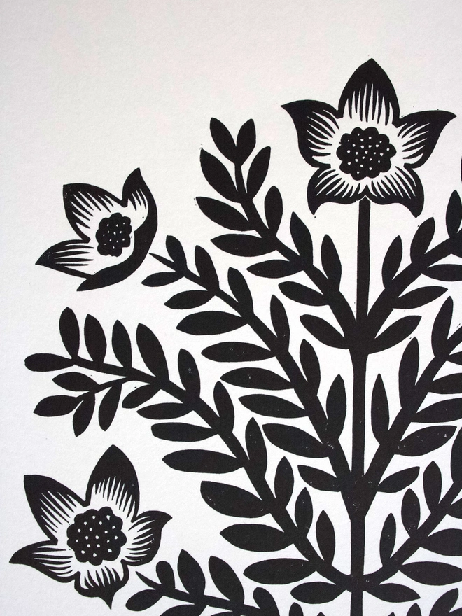 A4 Linocut print of symmetrical flower design