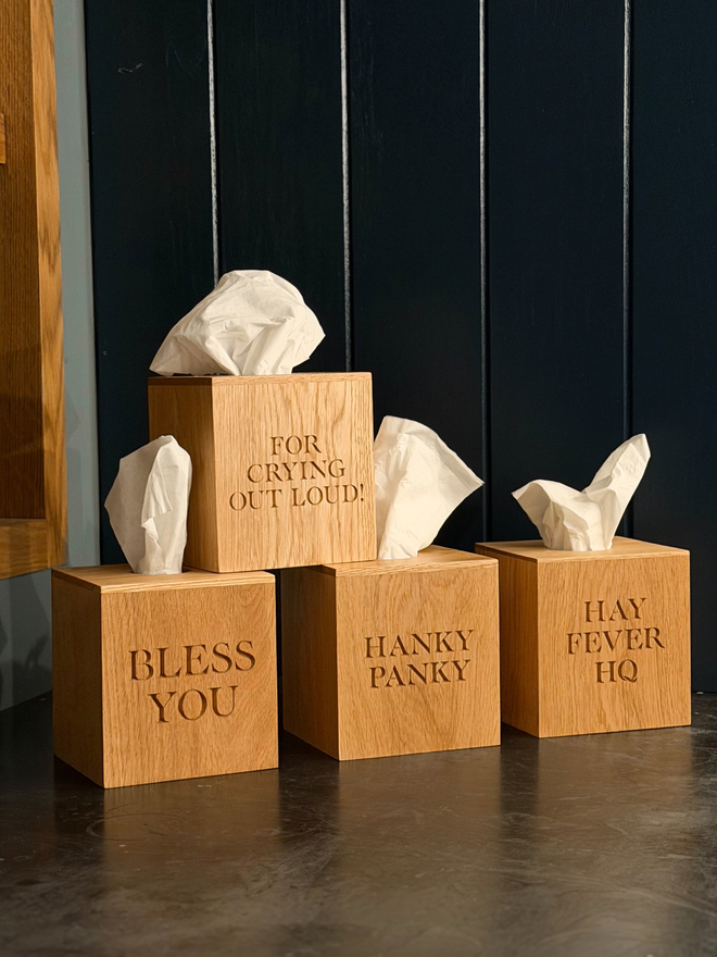 collection of engraved tissue boxes