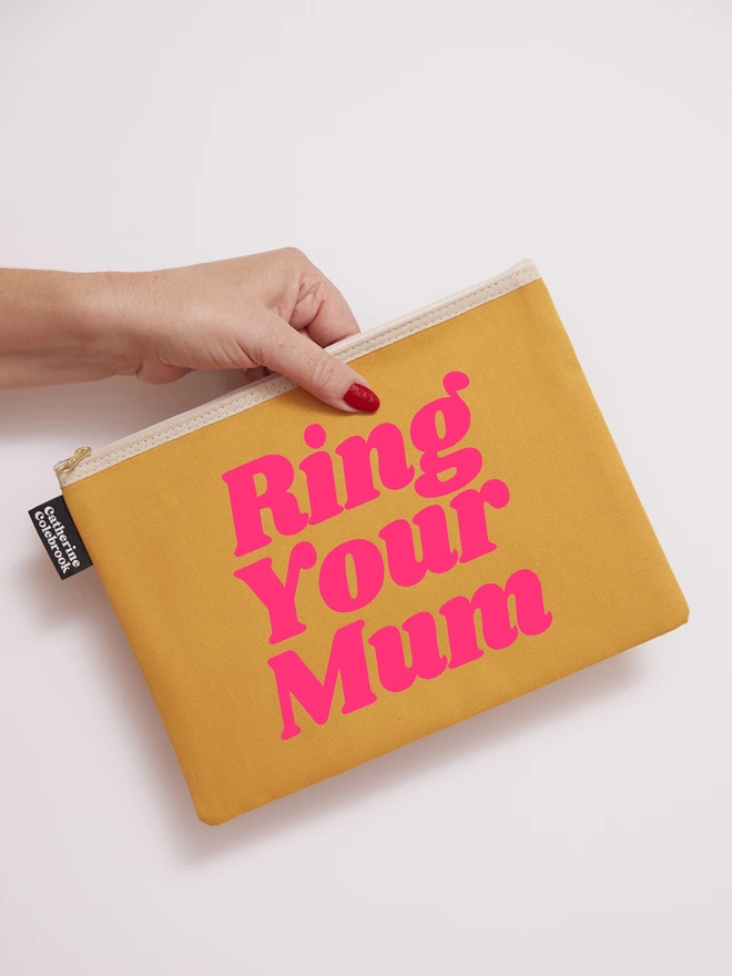 CATHERINE COLEBROOK RING YOUR MUM PURSE MUSTARD:NEON PINK