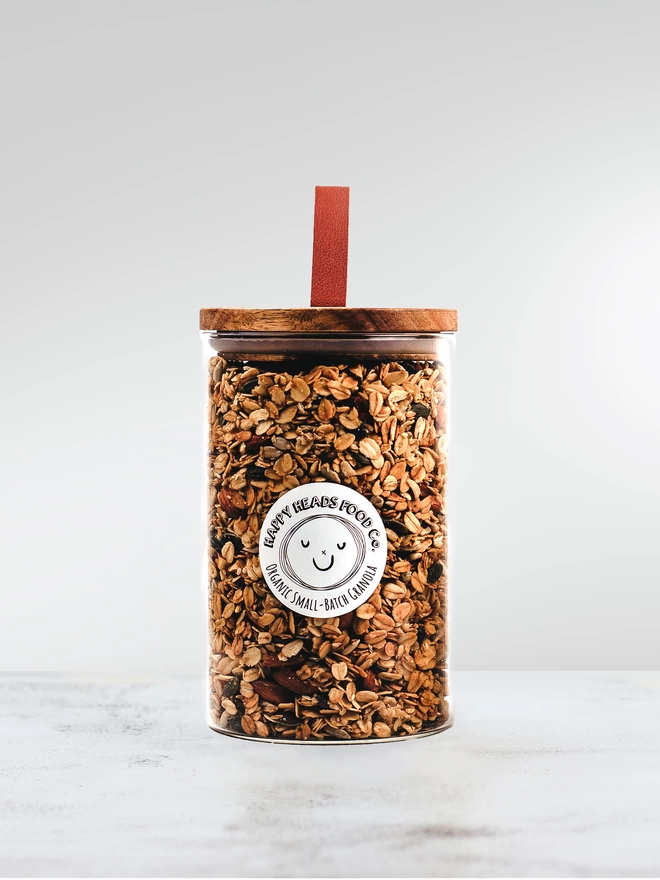 Happy Heads 'Original' granola in a medium (400 g) glass jar