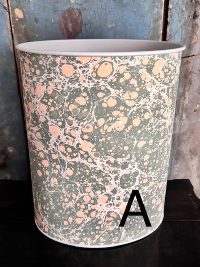 Oval Waste Paper Bin. A bin in A
