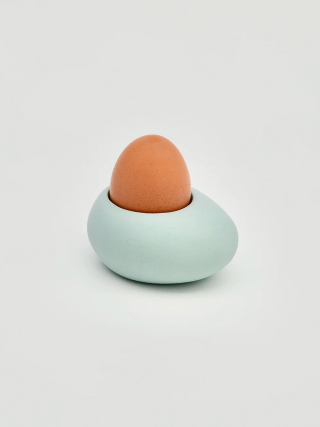 Kelly Egg Cup. A turquoise egg cup.