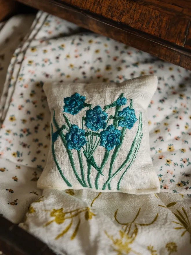 Blue floral bloom Lavender Sachet. A sachet of Lavender with embroidered floral design.