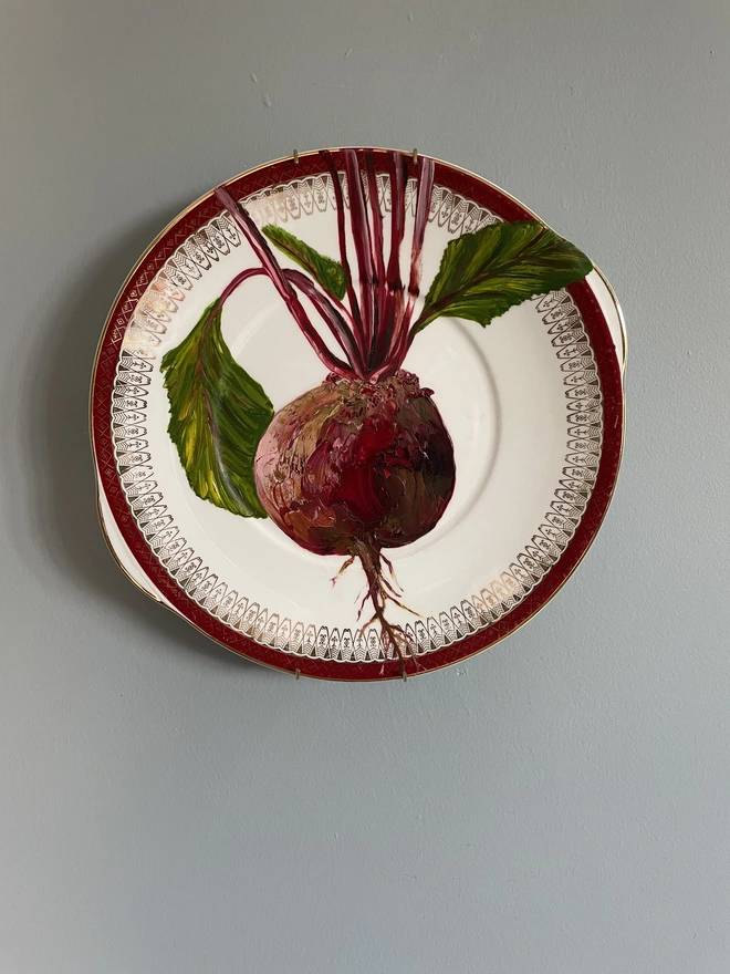 beetroot oil painting on vintage plate