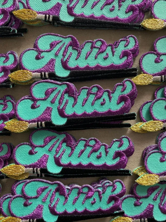 Artist embroidered iron on fabric patch 