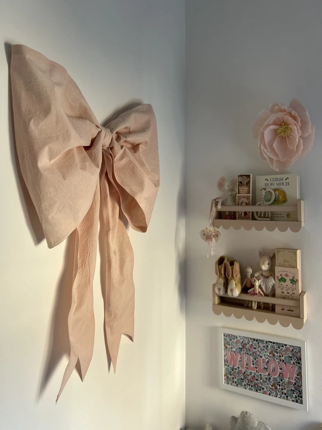 Pink decorative bow wall decoration