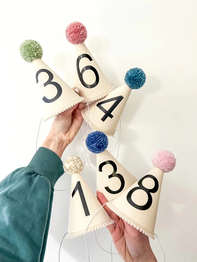 Canvas Party Hats with Black Numbers and coloured pom poms