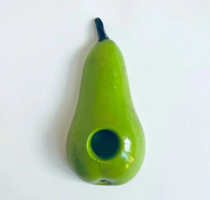Pear Candlestick Holder displayed against a white background. 
