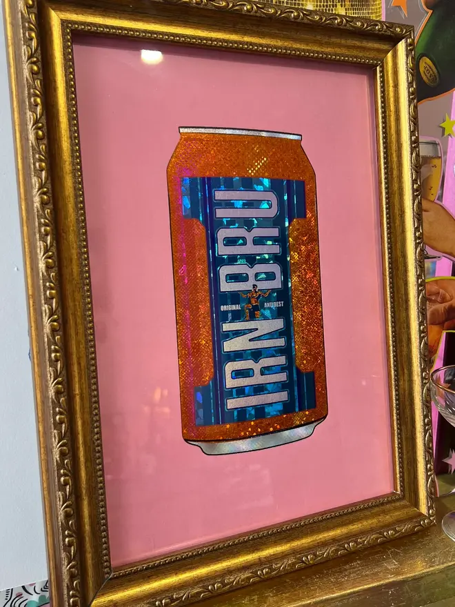'Irn Bru' Can ScreenPrint, a colourful Irn Bru screenprint sitting framed. 
