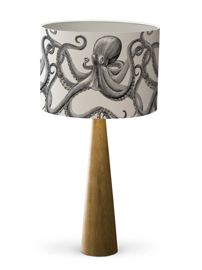 Drum Lampshade featuring Octopus with a white inner on a wooden base on a white background