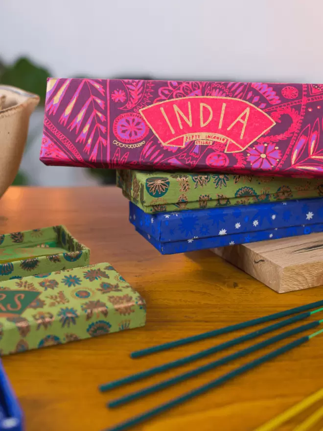 Close-up, detailed shot: all 3 package boxes for the 3 different incense sticks