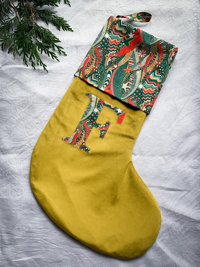 Gold velvet stocking with liberty print cuff and letter