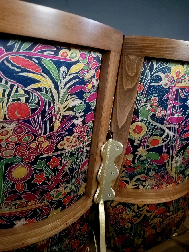Cinema seat backs with floral velvet inset and refinished wood frames