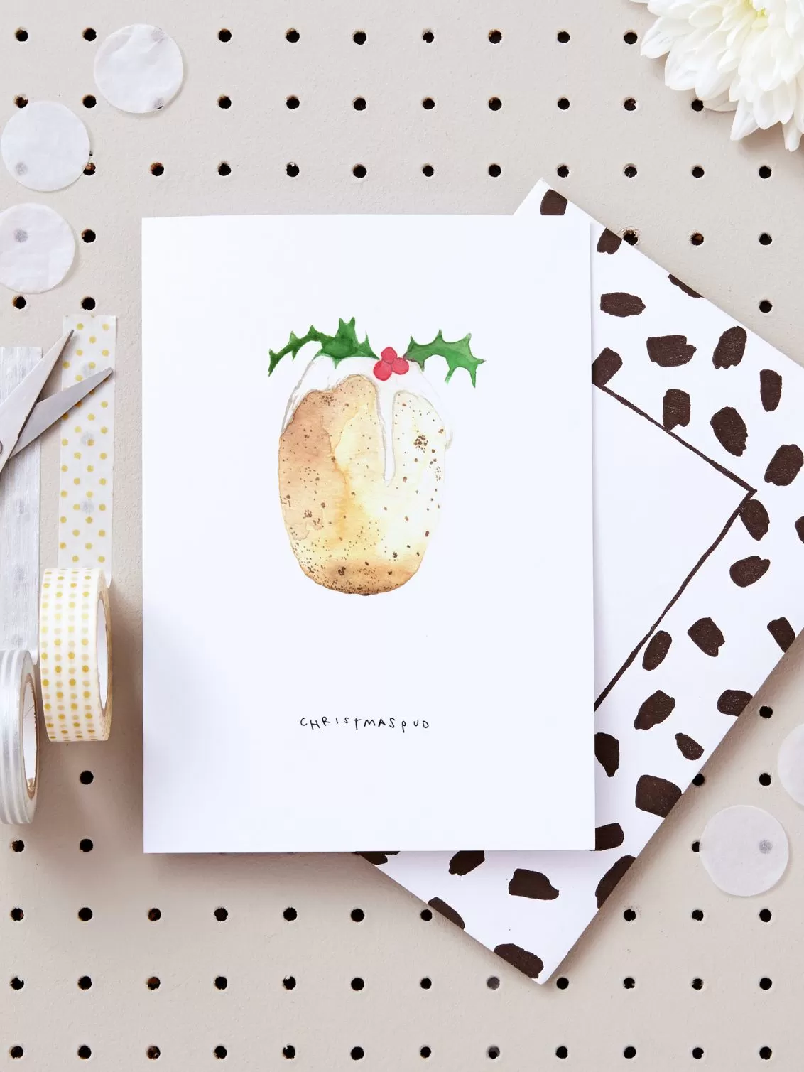 Blank Inside Christmas Pud Card seen with a black and white envelope.