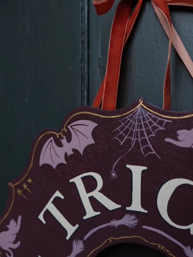 Purple and lilac Halloween Wreath with cat, bat and cobweb details and gold line work