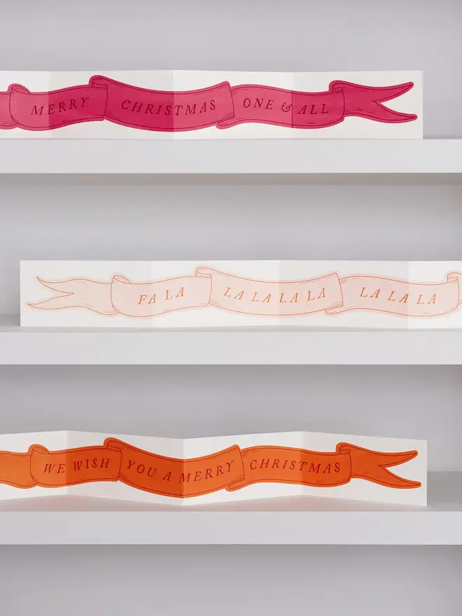 giant concertina christmas card decorations on shelves