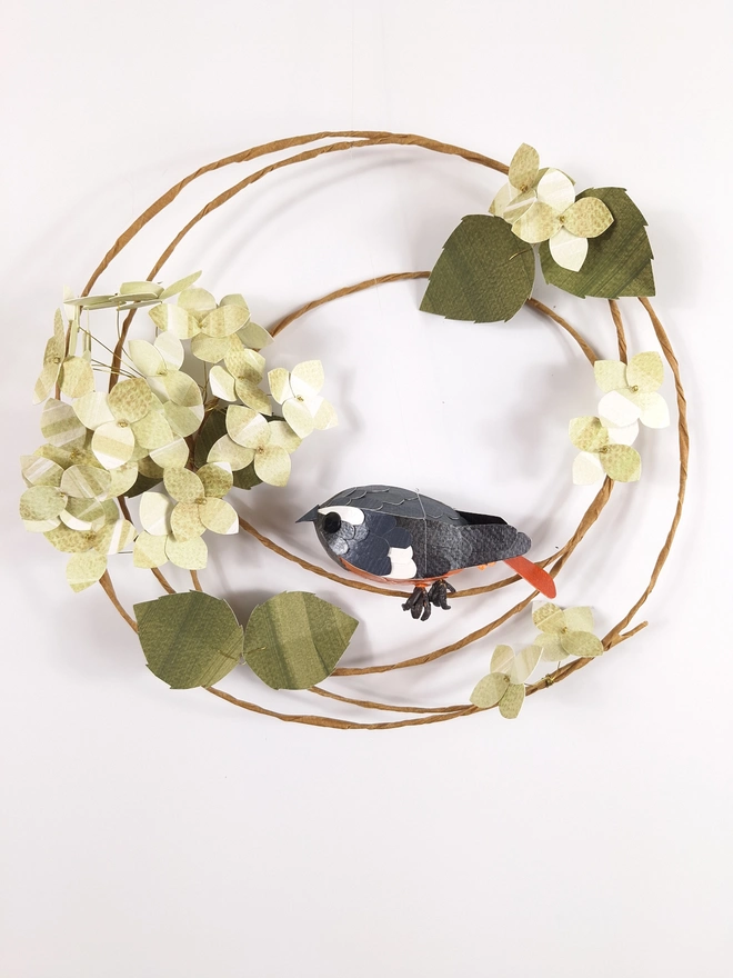 Redstart Sculpture On A Wreath of Green Hydrangea Blooms