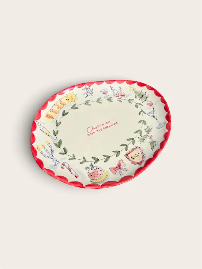 Personalised Christmas design Plate with a red trim 