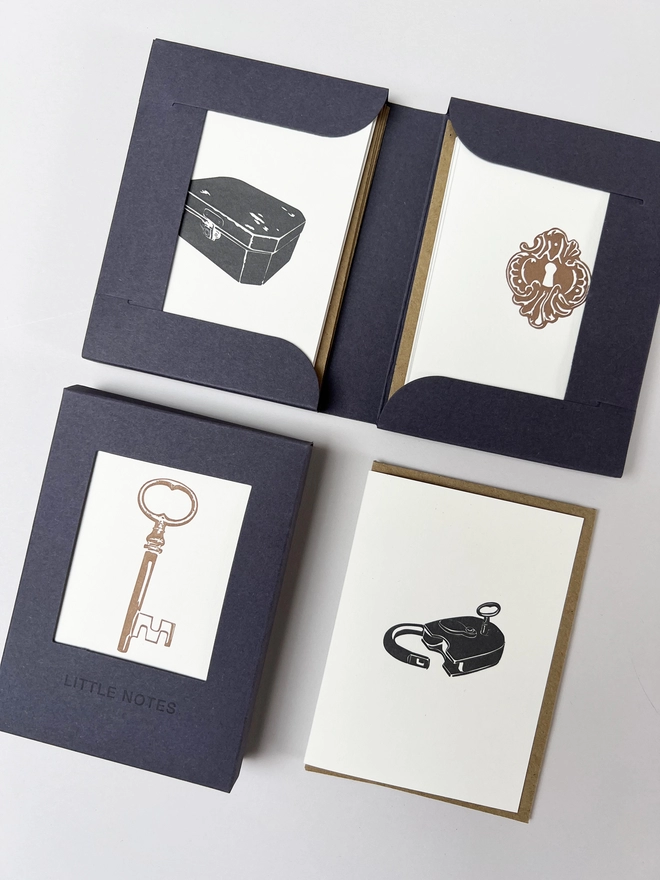 pen and closed Secter treasures gift boxes for little notes allowing you to see three of the four designs in one box