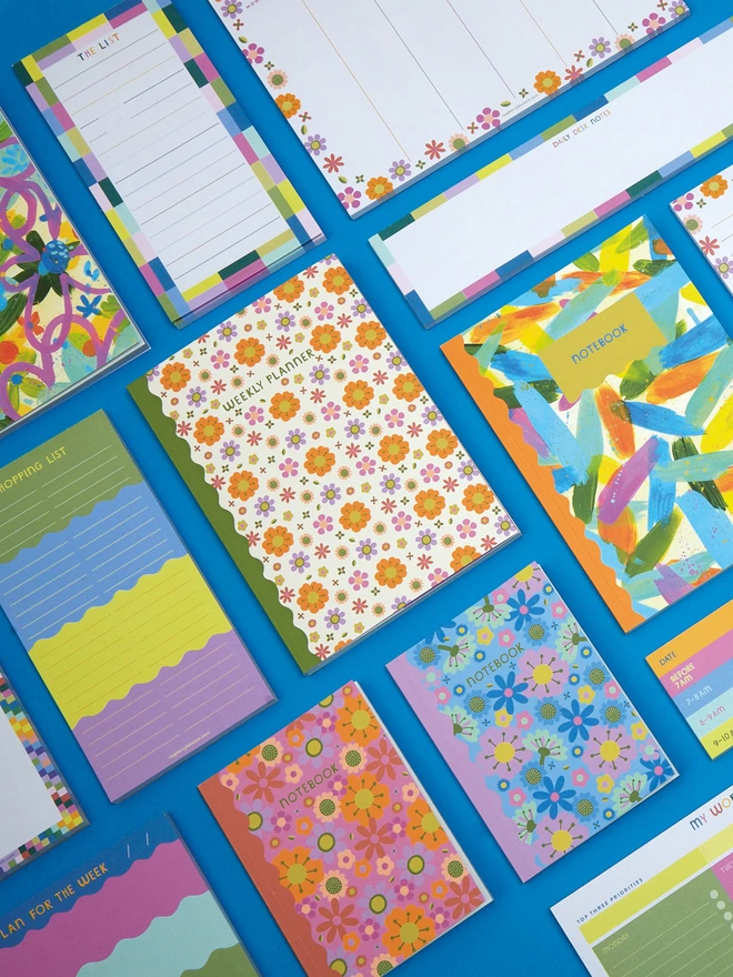 Flatlay of other colourful stationery items from the Raspberry Blossom ‘Happiness’ collection