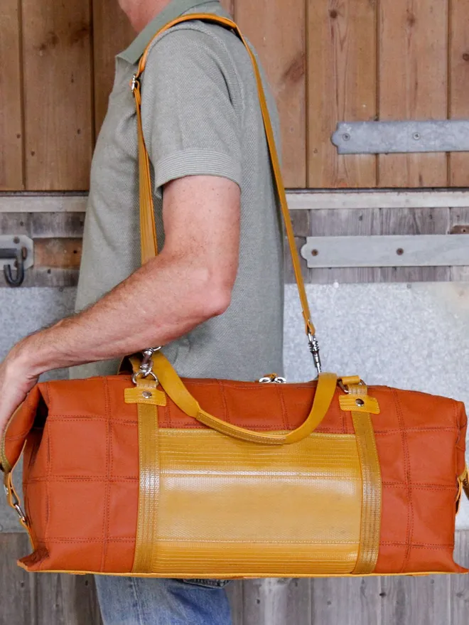 Rescued leather and fire-hose Weekend bag 
