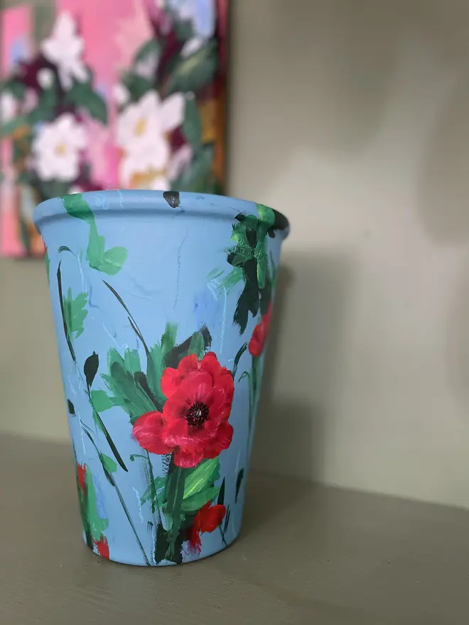 hand painted terracotta floral plant pot air force blue with rich red poppy flowers 