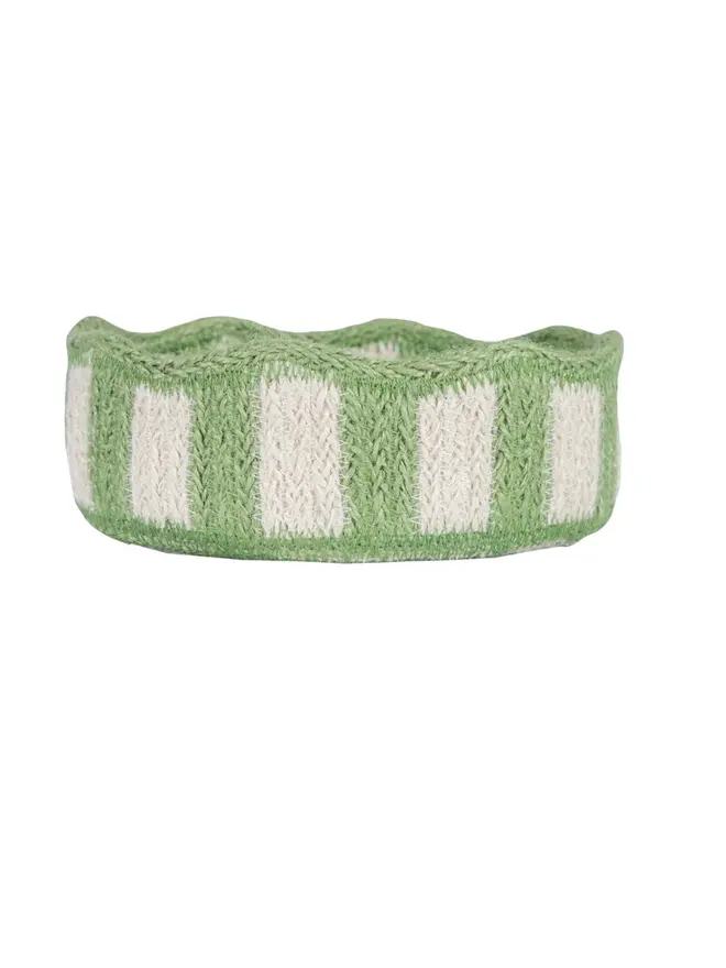 Green mini stripy scalloped organic jute basket on a white background.