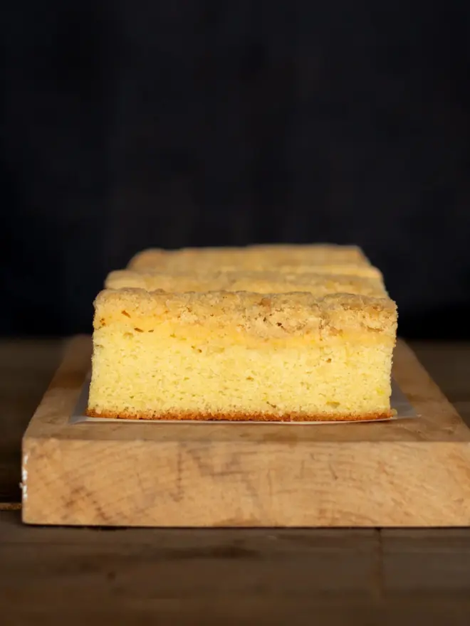 A tray of lemon curd crumble cake