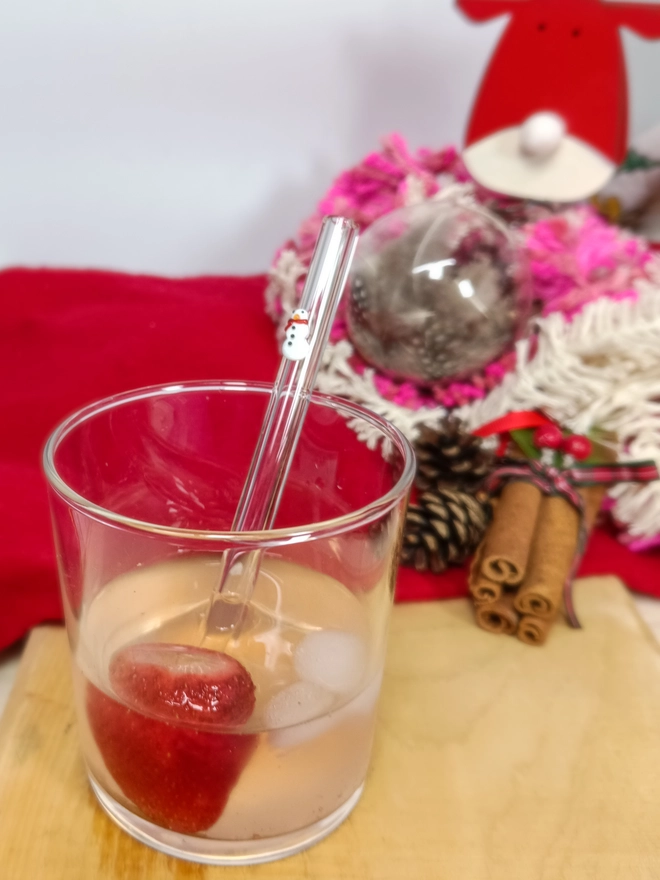 short snowman straw inside a glass