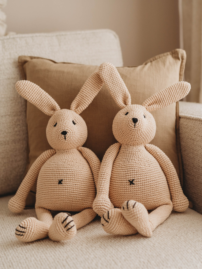 handmade crochet bunny rabbits on sofa