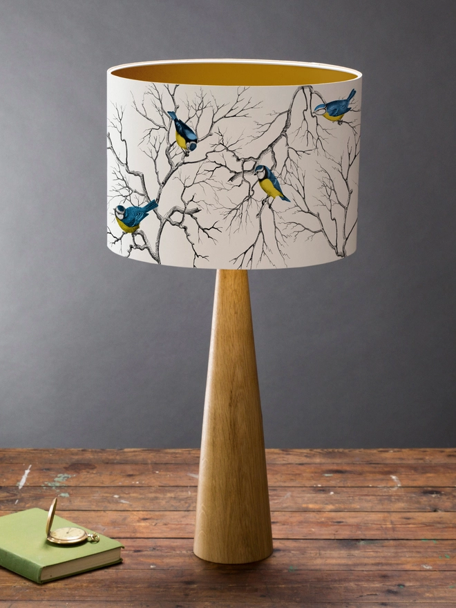 Blue Tit lampshade featuring a playful pattern of colourful British garden birds.